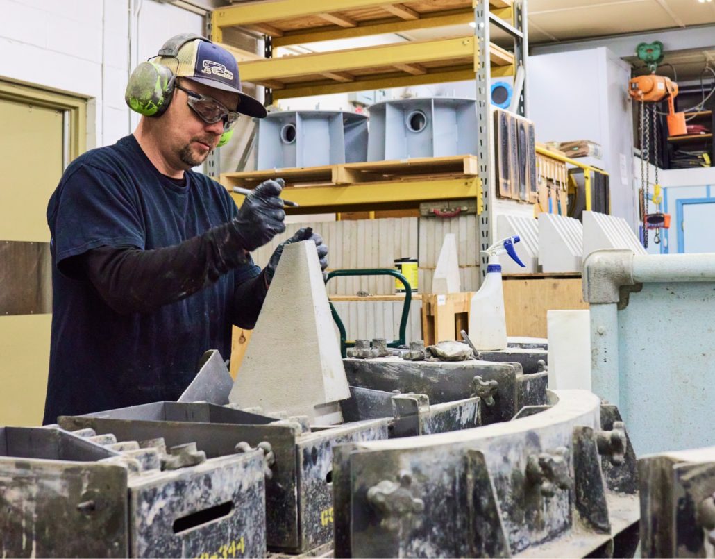 Halmar tile specialist marking a liner tile before packaging Halmar tile specialist marking a liner tile before packaging
